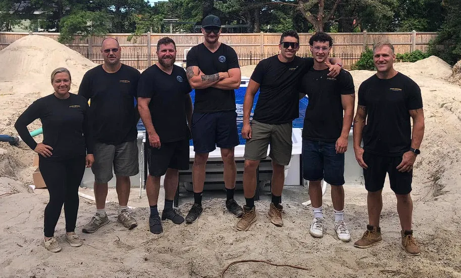 The Mowry Brothers Pools team on a pool installation job site